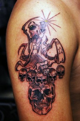 Grim Reaper And Skulls Arm Tattoo