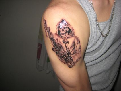 Grim Reaper Tattoo On Right Shoulder
