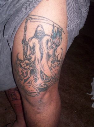 Reaper Tattoo On Thigh