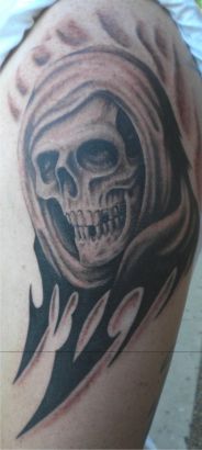 Tribal Reaper Tattoo Pic On Arm