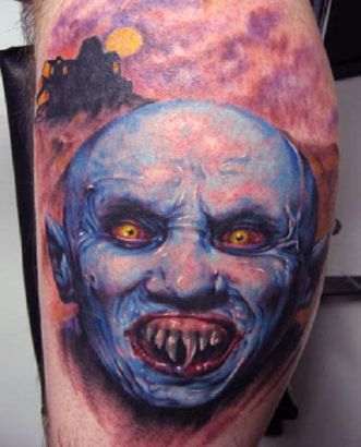 Blue Vampire Head Tattoo