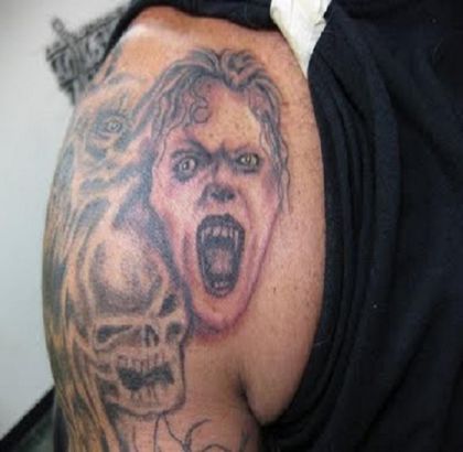 Skull And Vampire Tattoo On Shoulder