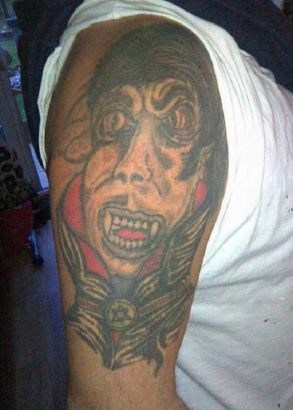 Vampire Tattoo On Right Arm