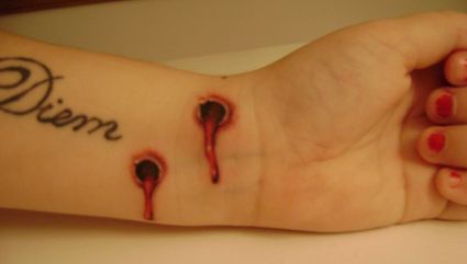 Vampires Bite Tattoo On Wrist