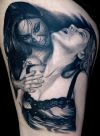 vampire girl tattoo on thigh