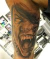 vampire pic tattoo on arm