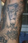 vampires skulls tattoo on rib