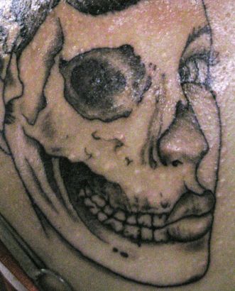 Zombie Tattoo Image On Lower Back