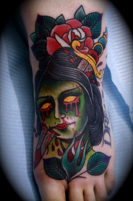 Zombie Face Tat On Ankle