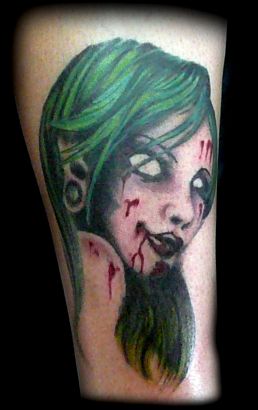 Tattoo Of Zombie Face On Leg