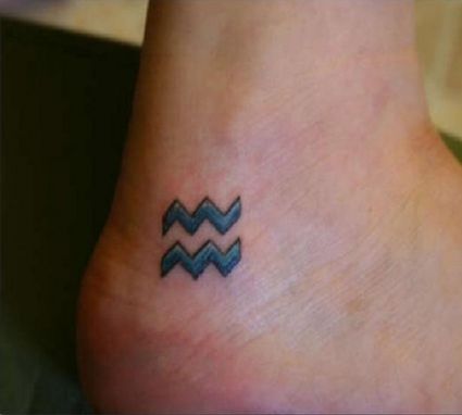 Aquarius Pic Tattoo On Foot