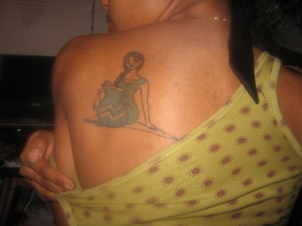 Aquarius Tattoo On Back