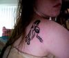 aquarius pic tattoo on back of girl
