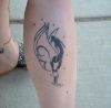 aquarius pic tattoo on leg