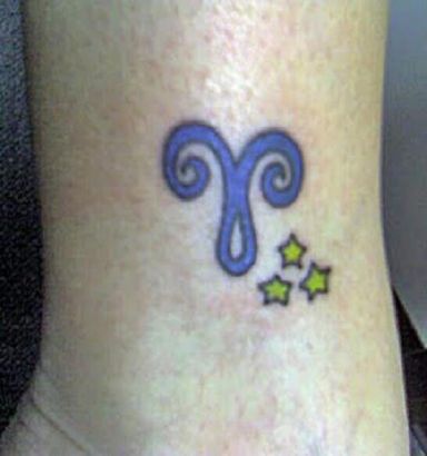 Aries Sign And Small Star Tattoo