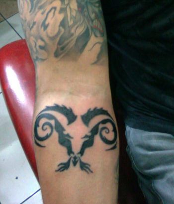 Aries Tribal Tattoo On Arm