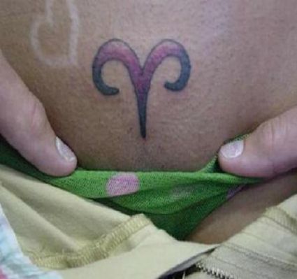 Zodiac Aries Tattoo On Lower Stomach