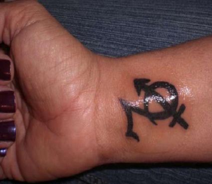 Capricorn And Sagittarius Tattoo On Wrist