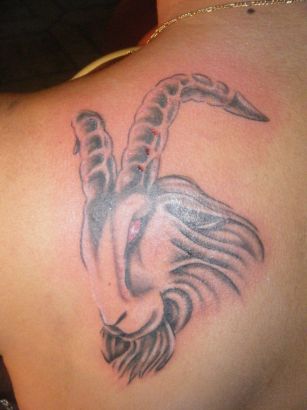 Capricorn Pic Tattoo On Left Arm Shoulder