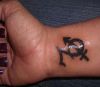 capricorn and sagittarius tattoo on wrist