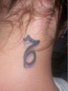 capricorn pics tattoo on neck