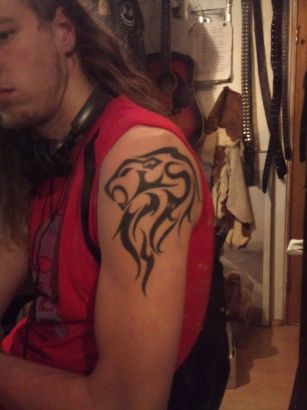 Leo Tattoo Pic On Arm