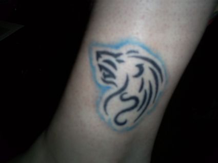 Leo Tattoo Pics On Leg