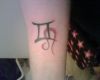 gemini and leo tattoo