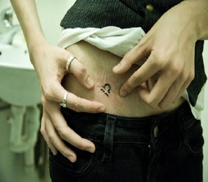 Libra Sign Tattoo On Lower Stomach