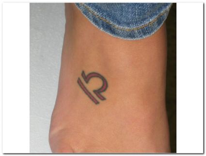 Libra Sign Tattoo On Feet