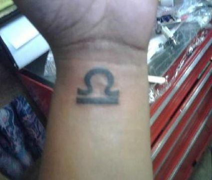 Zodiac Libra Tattoo On Wrist