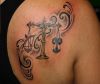 libra pic tattoo on shoulder