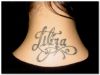 libra text tattoo on back of neck