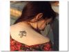 libra zodiac tats on girl's back