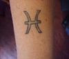 pisces sign pic tattoo