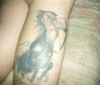 sagittarius pic tattoo on leg