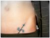 sagittarius pics tattoo on lower stomach