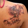 sagittarius zodiac tattoo on right shoulder blade