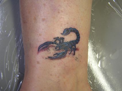 Scorpio On Leg