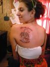 scorpio tats on girls back