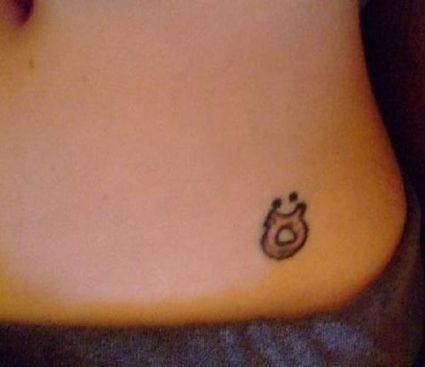 Taurus Sign Tattoo On Lower Stomach