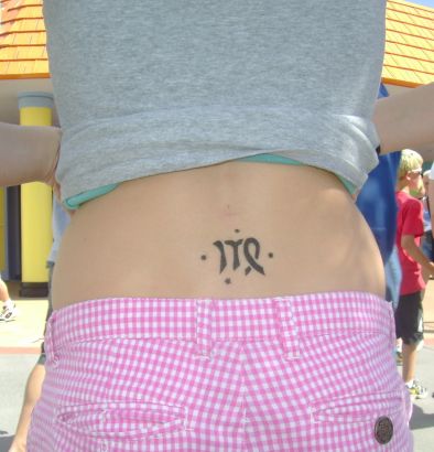 Virgo Sign Tattoo On Lower Back