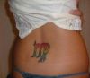 virgo sign tattoo on back of girl